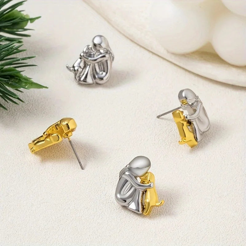 Argilla Sicilia | Orecchini Hug bicolore argento e oro